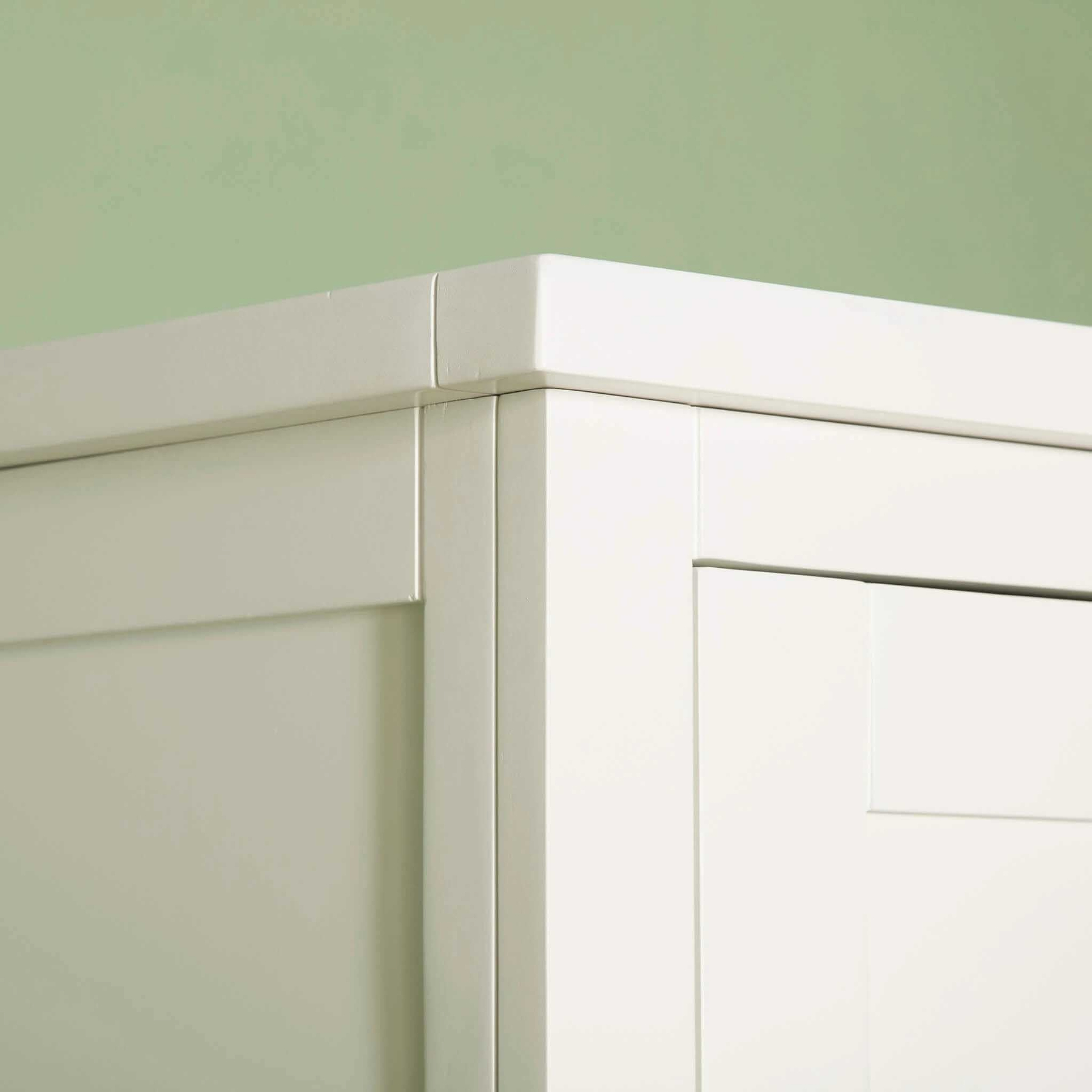 Close up of top corner on The Cornish White Large 3 Door Wardrobe