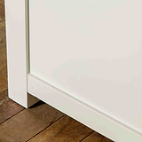 Close up of rear leg on The Cornish White Ottoman Blanket Box