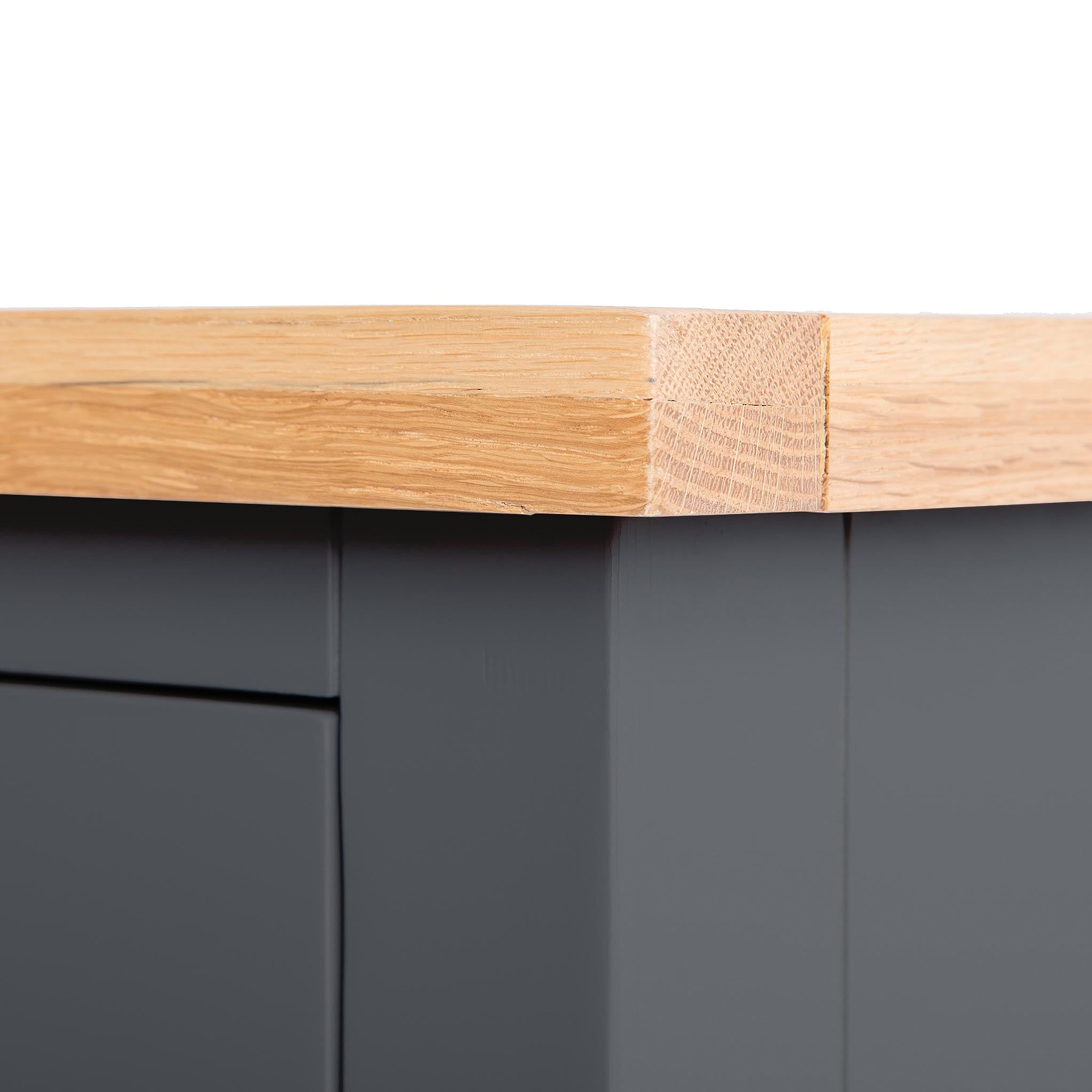 A wooden plank with a bandage is resting on a grey surface, suggesting a whimsical concept of furniture repair.