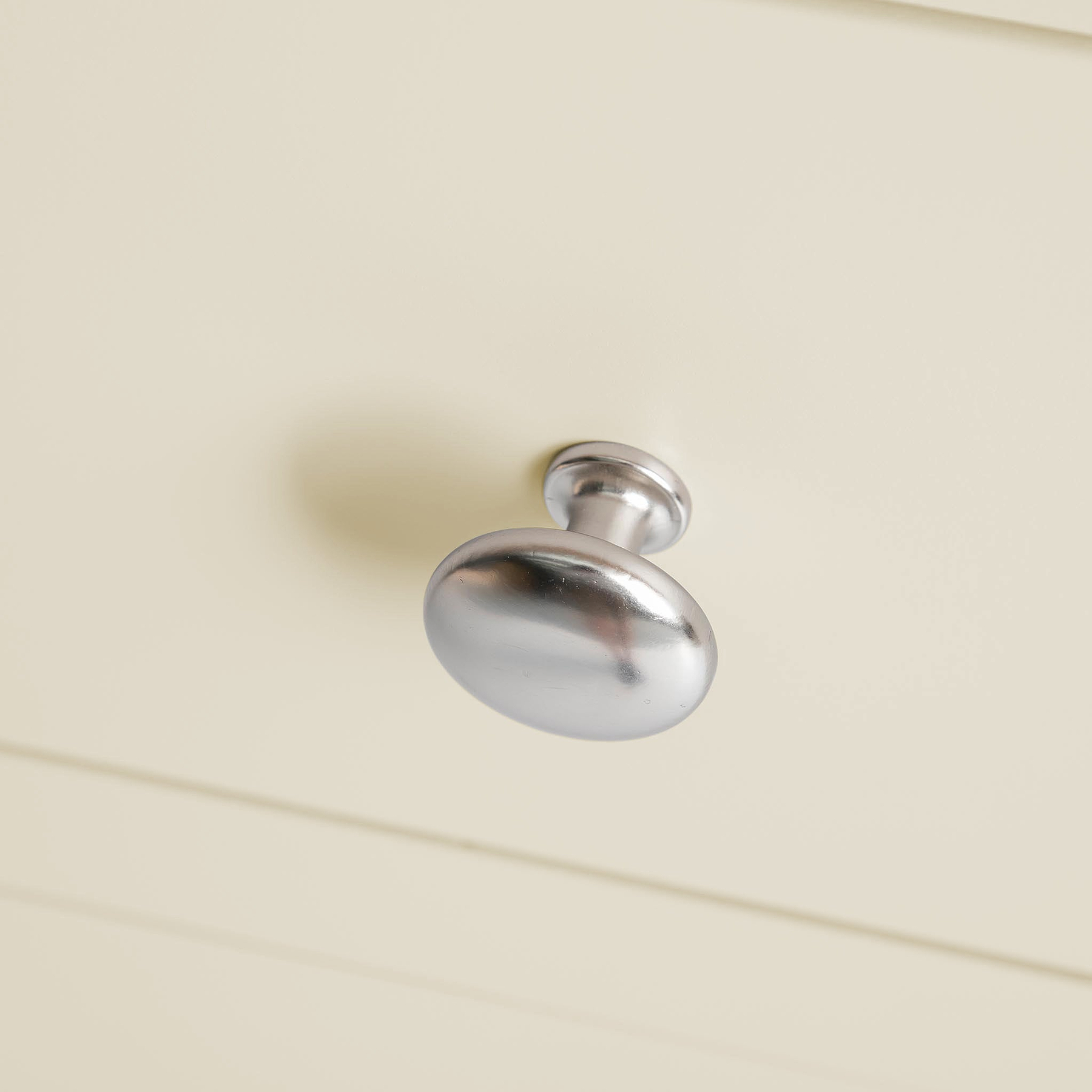 Farrow Cream 2 Over 3 Chest Of Drawers from Roseland Furniture - close up of silver handles