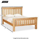A wooden bed with two pillows, dimensions marked as 195cm wide, 114cm high, and 217cm long. Logo: Roseland Furniture. Text: "Image for size information only."