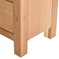 Surrey Oak 5 drawer tallboy chest of 5 drawers - Close up of  feet of tallboy