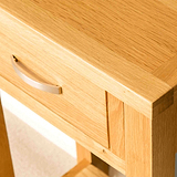 Metal handle on the London Oak Telephone Table by Roseland Furniture