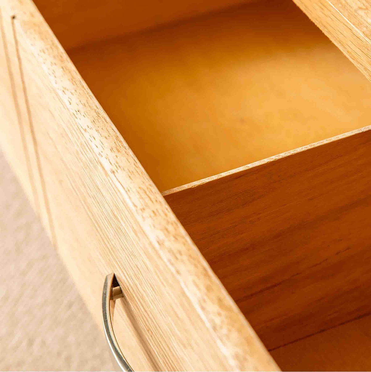 Inside a drawer of a London Oak Corner TV Stand