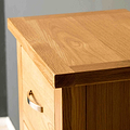 Close up of the top surface of a London Oak Tallboy Chest.