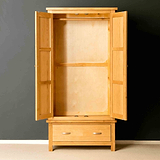 View inside a free standing double wardrobe. 