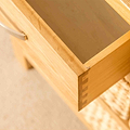 Open drawer on a London Oak Console Table with baskets. 