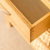 Open drawer on a London Oak Console Table with baskets. 