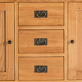 central drawers on the Surrey Oak 3 Drawer Sideboard by Roseland Furniture