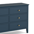 close up of gold handles on the Stirling Blue 3 over 3 Chest of Drawers