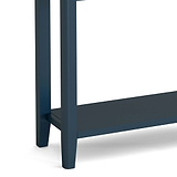 close up of tapered legs and lower shelf on the Stirling Blue Console Table