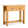 A wooden console table stands, featuring two drawers with metal handles, against an isolated white background.