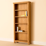 Light oak bookcase with five shelves, holding books.