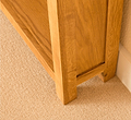 Lanner Oak Narrow Bookcase bottom front corner view