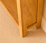 Lanner Oak Narrow Bookcase bottom front corner view