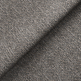 Textured fabric with a herringbone pattern, folded to create a shadow, with neutral brown and grey tones.