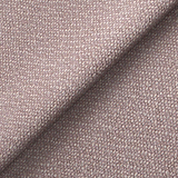 Textured fabric with a diagonal fold, presenting a herringbone pattern in shades of brown, laid flat with shadow defining the crease.