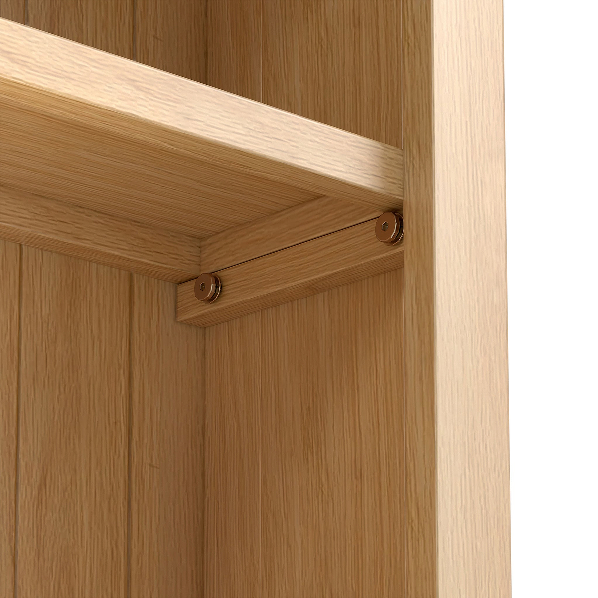 A wooden shelf is secured against a vertical wooden surface with screws, highlighting a simple, clean joinery construction.