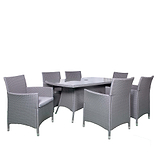 A gray wicker patio dining set with six chairs around a glass-top table, isolated against a white background.