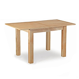 A wooden table with a light finish stands against a white backdrop, featuring a simple, sturdy design with thick, straight legs. There is no text.