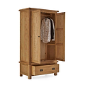 Zelah Oak Double Wardrobe with Drawer - Side view with wardrobe and drawer open and some clothes hanging