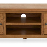 Zelah Oak 150cm TV Stand - Close up of middle shelving and cable access holes