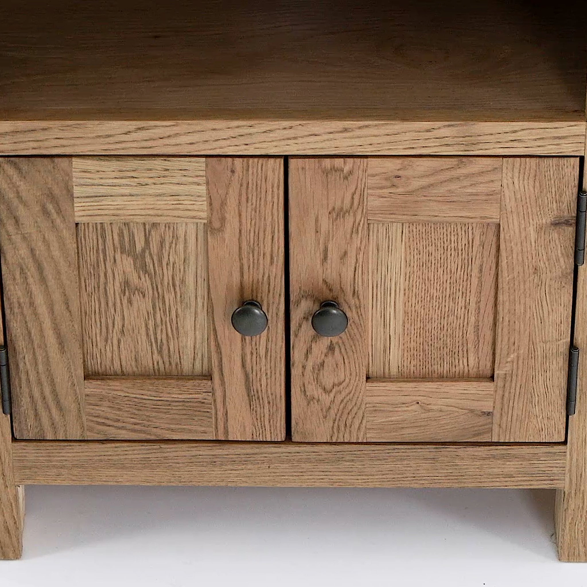 Zelah Oak Corner TV Stand - Looking down of cupboard doors