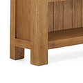 Zelah Oak Small Bookcase - Close up of feet of bookcase