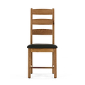 Wooden chair with black cushioned seat and ladder-style back.