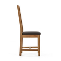 Side view of a wooden chair with a dark brown cushioned seat.