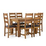 A wooden dining table set with six chairs, padded in dark material, isolated against a plain white background.