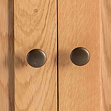Surrey Oak Small Cupboard - Close up of cupboard door knobs