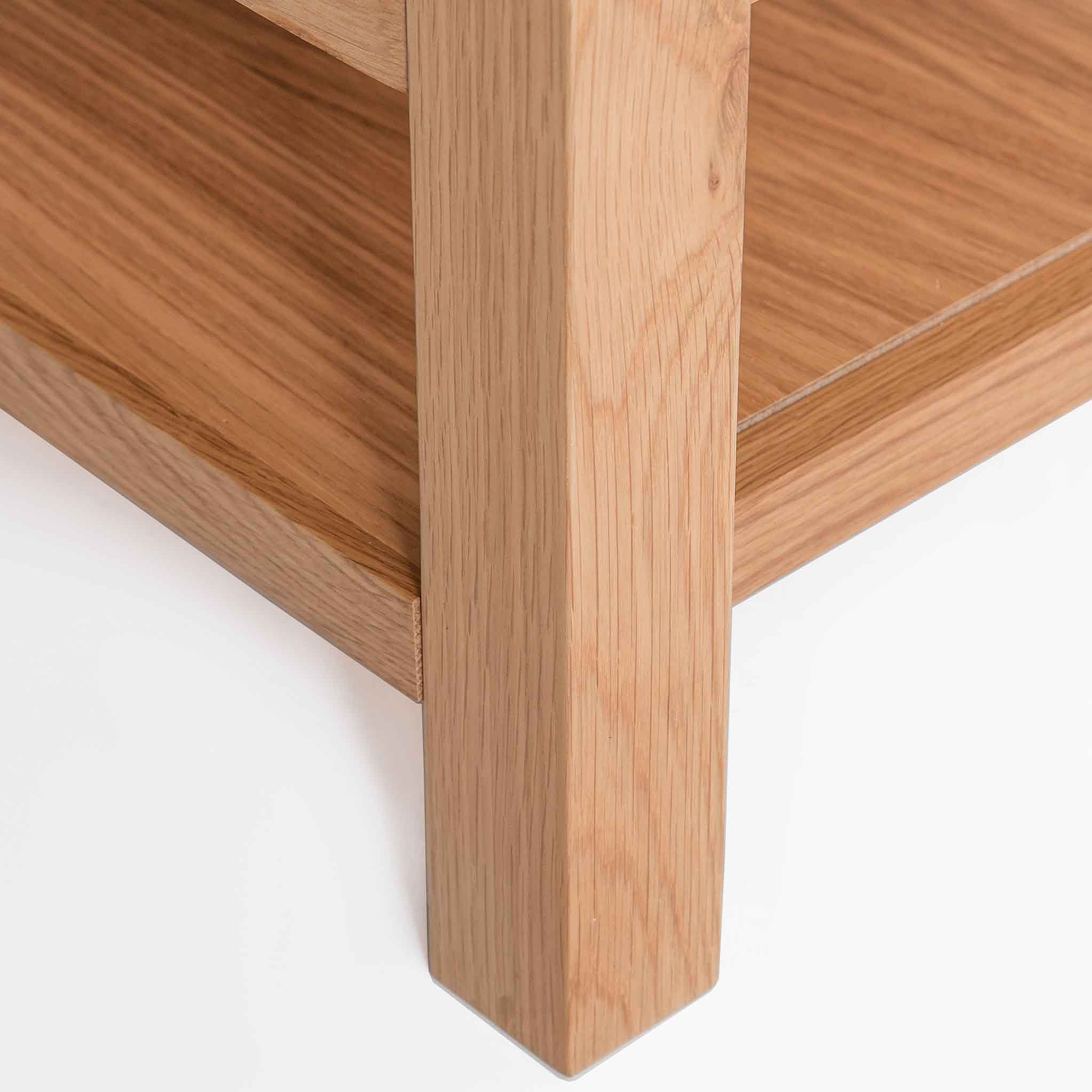 London Oak Coffee Table with Drawer - View of lower shelf and foot of coffee table