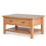 A wooden coffee table with two drawers and a lower shelf stands isolated against a white background.