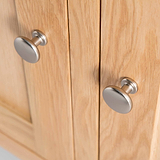 close up of metal door knobs on London Oak Large Sideboard