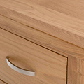 close up of the oak top edge on the London Oak Tallboy Chest by Roseland Furniture. 