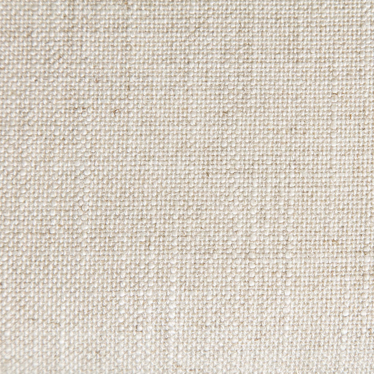 A close-up texture of beige fabric showcasing intricate weave detail with small, raised nodules spread consistently across the surface.