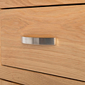 close up of contemporary metal handle on the London Oak Mini Sideboard by Roseland Furniture. 