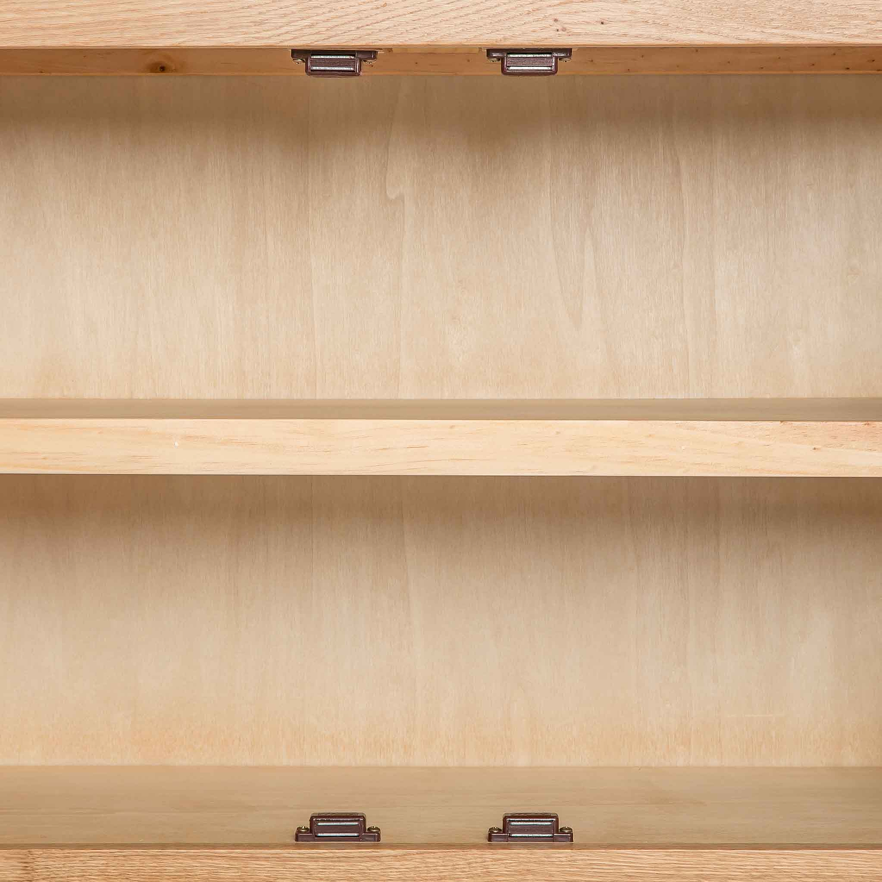close up of the internal fixed shelf on the London Oak Mini Sideboard by Roseland Furniture. 