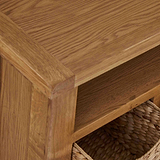 Zelah Oak Corner TV Stand with Baskets - Close up of top front corner