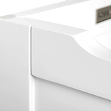 A close-up of a white, curved bathtub edge with a blurred background, conveying a clean and modern bathroom aesthetic. There is no text in this image.