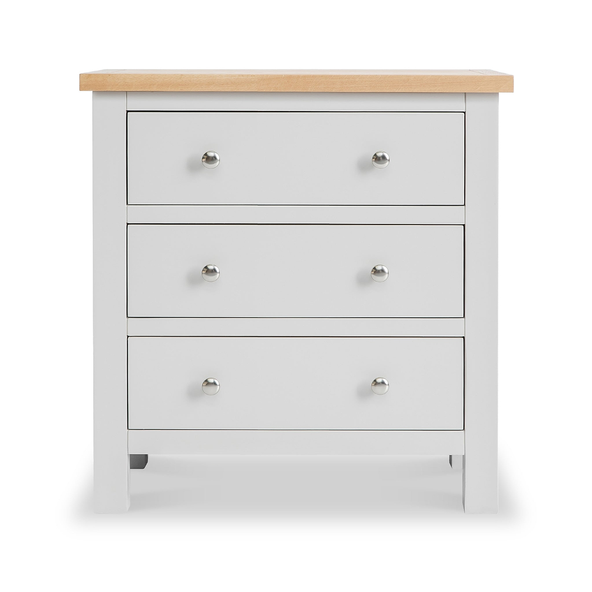 A white three-drawer chest with a natural wood top and round silver knobs on a plain background.