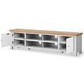 A long, low white TV stand with a light wood top has multiple compartments and two closed drawers, one open, isolated on a white background.