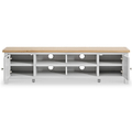 A long wooden-top TV stand with white supports, multiple open shelves, and a single closed drawer, isolated against a white background.