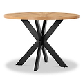 A round wooden table with black, intersecting, X-shaped metal legs, presented on a white background for emphasis.