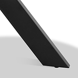 Slim black electronic device angled backwards against a uniform light background, possibly a tablet or monitor in a tilted position.