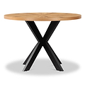 A round wooden table stands on a black X-shaped base, isolated against a white background.