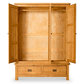 An open wooden armoire with empty shelves and two drawers below, isolated on a white background.