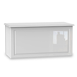 A rectangular white window with a transparent glass pane, reflecting a faint image of buildings, set against a plain, bright background.