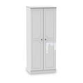 A white, freestanding wardrobe with closed double doors stands isolated against a plain, light background.